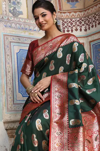 Bottle green silk blend woven saree with paisley motifs