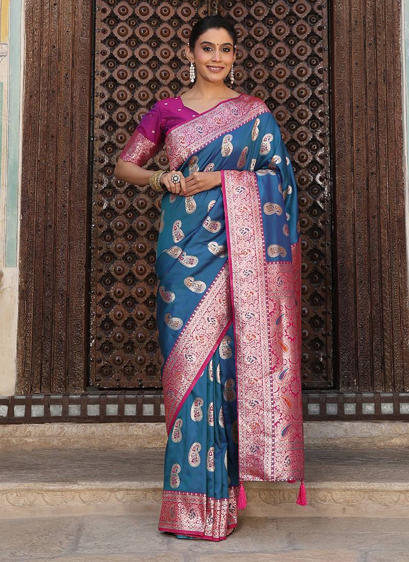 Teal blue silk blend woven saree with paisley motifs