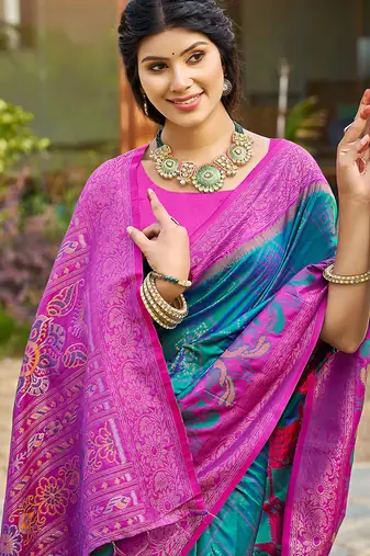 Teal blue banarasi silk blend woven saree with contrast border