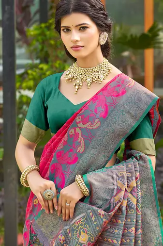 Rani pink banarasi silk blend woven saree with contrast border
