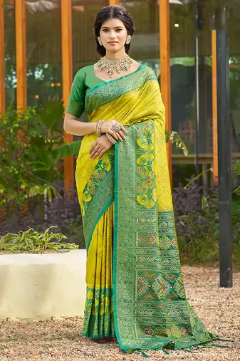 Lemon yellow banarasi silk blend woven saree with contrast border