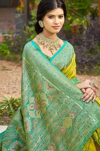 Lemon yellow banarasi silk blend woven saree with contrast border