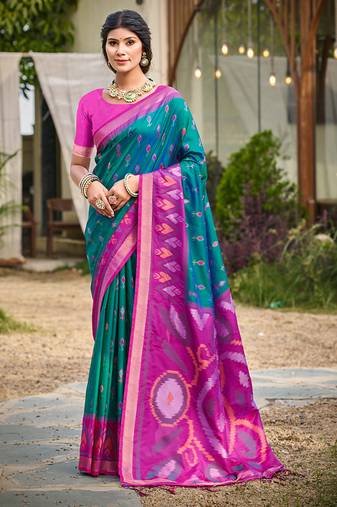 teal pochampally silk blend saree with contrast border
