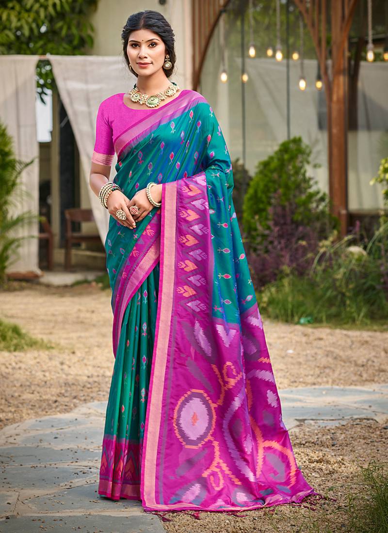teal pochampally silk blend saree with contrast border