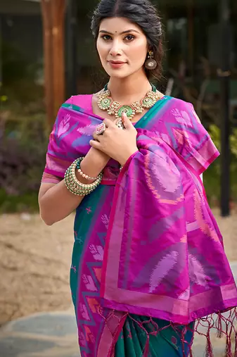 teal pochampally silk blend saree with contrast border