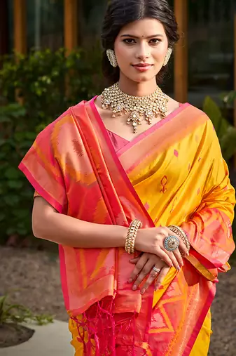 yellow pochampally silk blend saree with contrast border