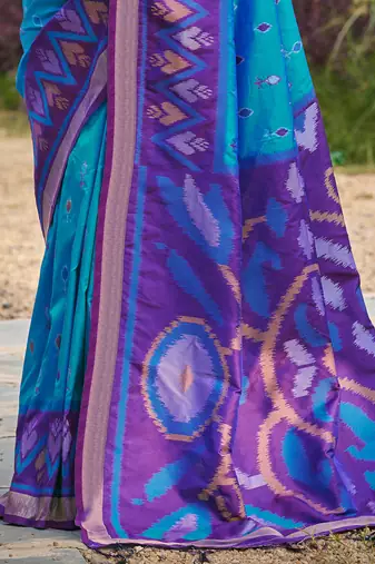 sky blue pochampally silk blend saree with contrast border