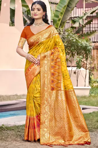 mustard yellow & rust banarasi silk blend saree with zari woven pallu