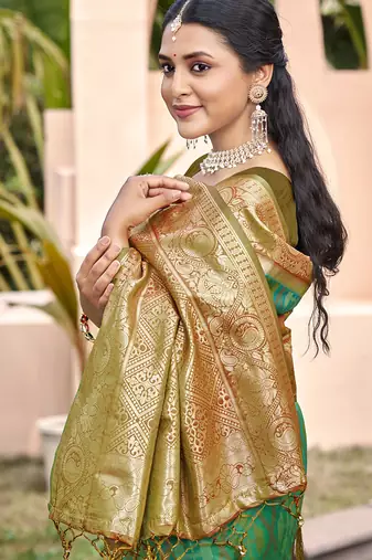 sea green & olive green banarasi silk blend saree with zari woven pallu