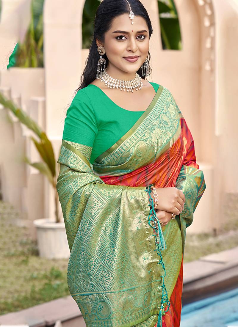 red & green banarasi silk blend saree with zari woven pallu