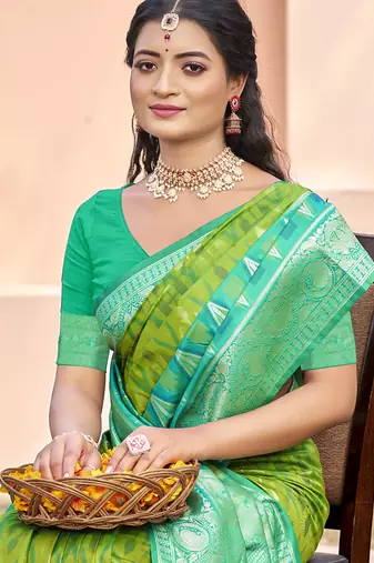 parrot green & sea green banarasi silk blend saree with zari woven pallu