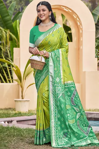 Light green silk blend woven saree with contrast pallu and border