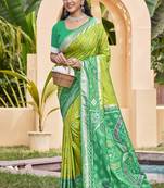 Light green silk blend woven saree with contrast pallu and border