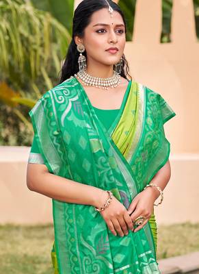 Light green silk blend woven saree with contrast pallu and border 2