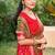 Olive green silk blend woven saree with contrast pallu and border