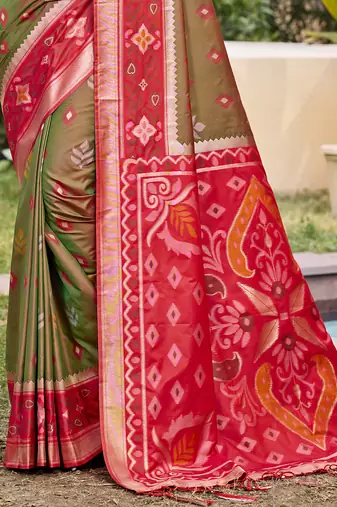 Olive green silk blend woven saree with contrast pallu and border