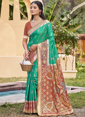 Sea green silk blend woven saree with contrast pallu and border 1