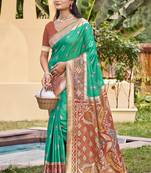 Sea green silk blend woven saree with contrast pallu and border