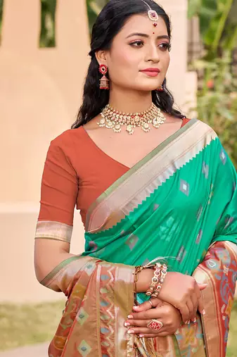 Sea green silk blend woven saree with contrast pallu and border