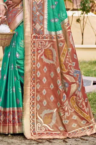 Sea green silk blend woven saree with contrast pallu and border