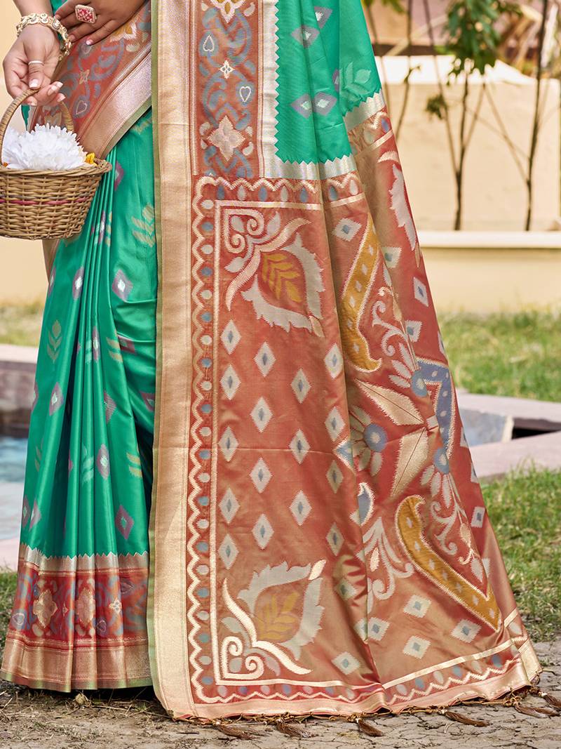 Sea green silk blend woven saree with contrast pallu and border