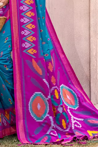 teal blue pochampally silk blend saree with contrast geometric pallu and border