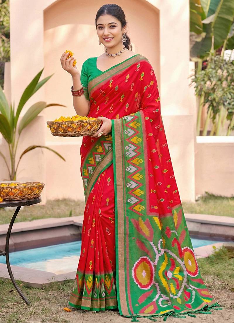 red pochampally silk blend saree with contrast geometric pallu and border