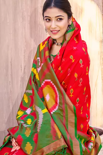 red pochampally silk blend saree with contrast geometric pallu and border