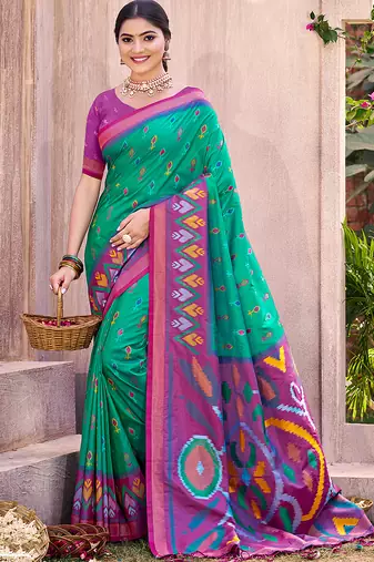 turquoise pochampally silk blend saree with contrast geometric pallu and border