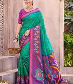 turquoise pochampally silk blend saree with contrast geometric pallu and border