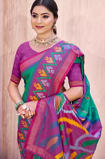 turquoise pochampally silk blend saree with contrast geometric pallu and border