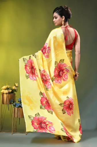 Yellow chinon silk saree with vibrant floral print