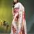 Beige chinon silk saree with vibrant floral print