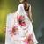 Beige chinon silk saree with vibrant floral print