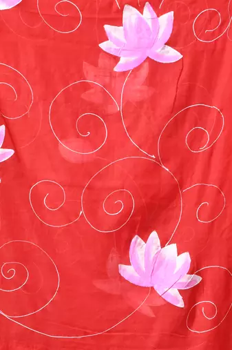 red mulmul cotton blend saree with lotus bloom print