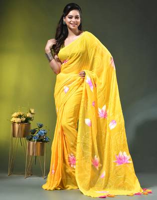 yellow mulmul cotton blend saree with lotus bloom print 1