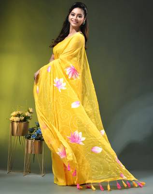 yellow mulmul cotton blend saree with lotus bloom print 3