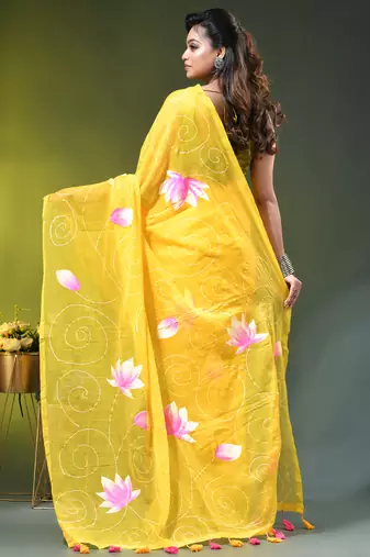 yellow mulmul cotton blend saree with lotus bloom print