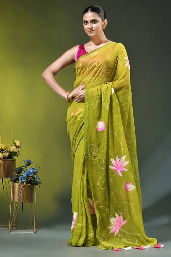 lime green mulmul cotton blend saree with lotus bloom print