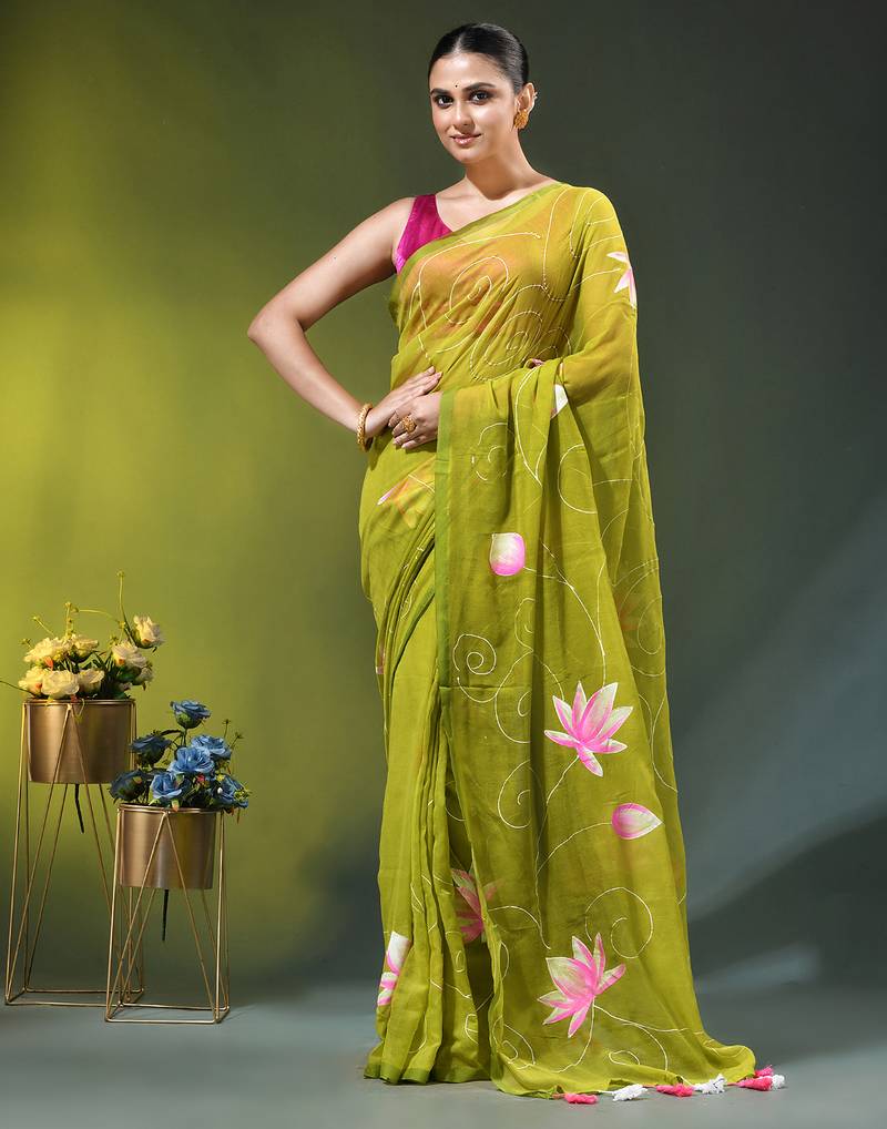 lime green mulmul cotton blend saree with lotus bloom print