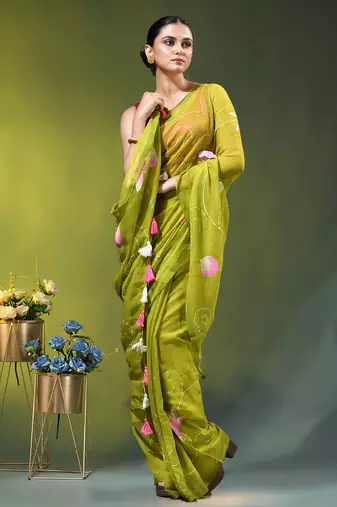 lime green mulmul cotton blend saree with lotus bloom print