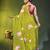 lime green mulmul cotton blend saree with lotus bloom print