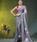 grey mulmul cotton blend saree with lotus bloom print