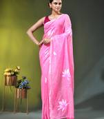light pink mulmul cotton blend saree with lotus bloom print