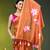 orange mulmul cotton blend saree with lotus bloom print