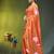 orange mulmul cotton blend saree with lotus bloom print
