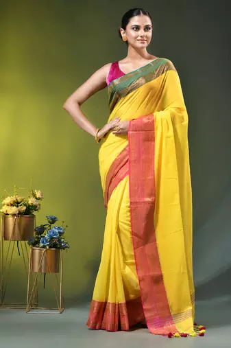 yellow mulmul cotton blend saree with ganga jamuna zari border
