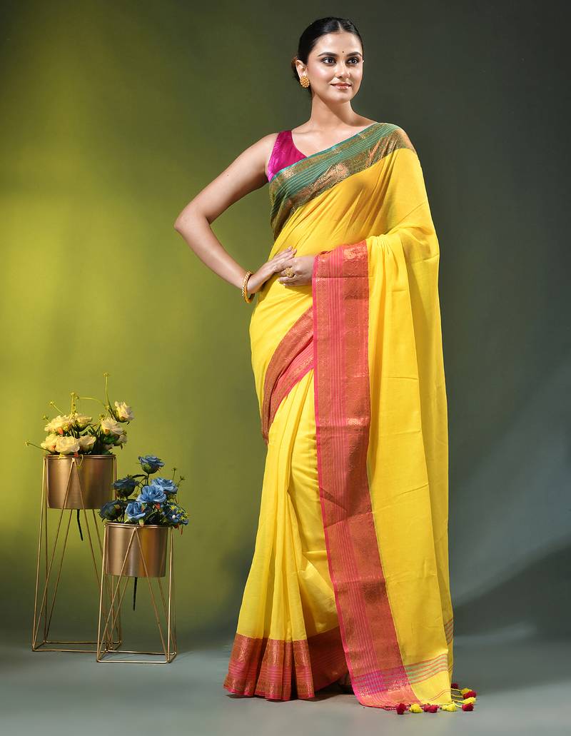 yellow mulmul cotton blend saree with ganga jamuna zari border