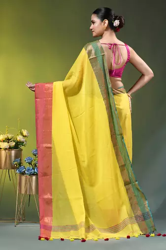 yellow mulmul cotton blend saree with ganga jamuna zari border