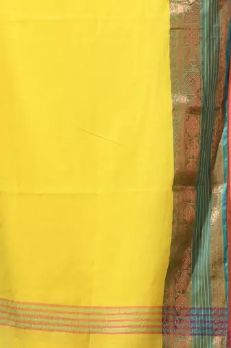 yellow mulmul cotton blend saree with ganga jamuna zari border